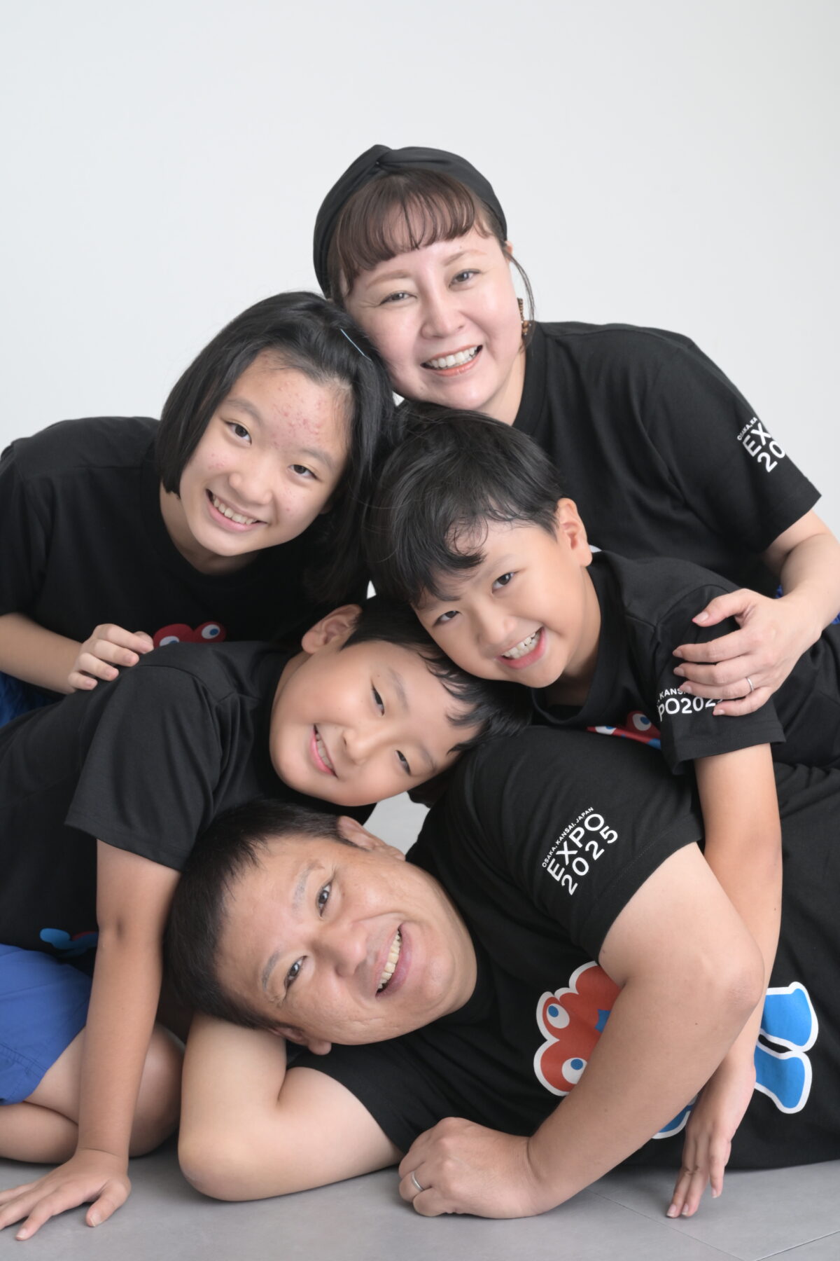 自然な写真のファミリーフォト（家族写真）